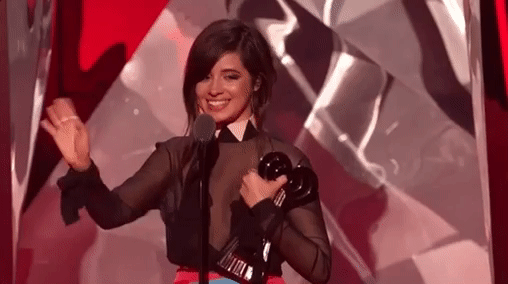 receiving an award at the iheartradio music awards